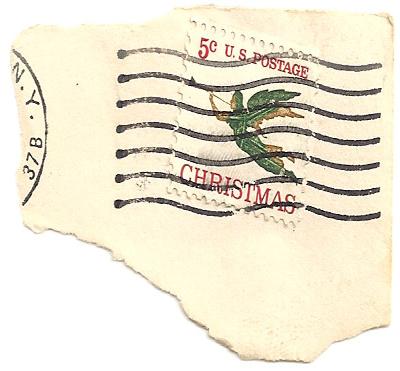 A stamp ripped from an envelope