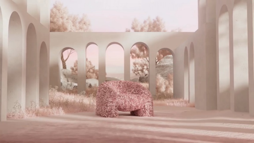 Fig. 6 A big pink armchair made of Hortensia petals is placed in the middle of a dreamy virtual scenery in pastel colors, with pale pink sky and trees and white arched walls.